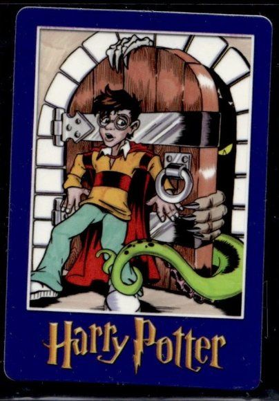 Harry Potter “Magic Will Happen” vending card: Harry bracing against a heavy wooden door with a clawed hand and green tail beside it